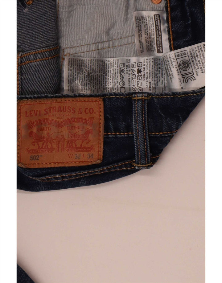 Мужские зауженные джинсы Levi's 502 W32 L34 синие, хлопок