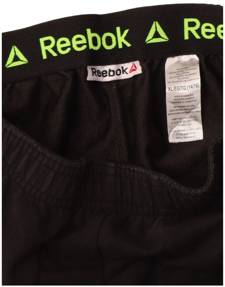 Спортивные брюки Reebok для мальчиков с графическим рисунком 14–15 лет, черный полиэстер, размер XL